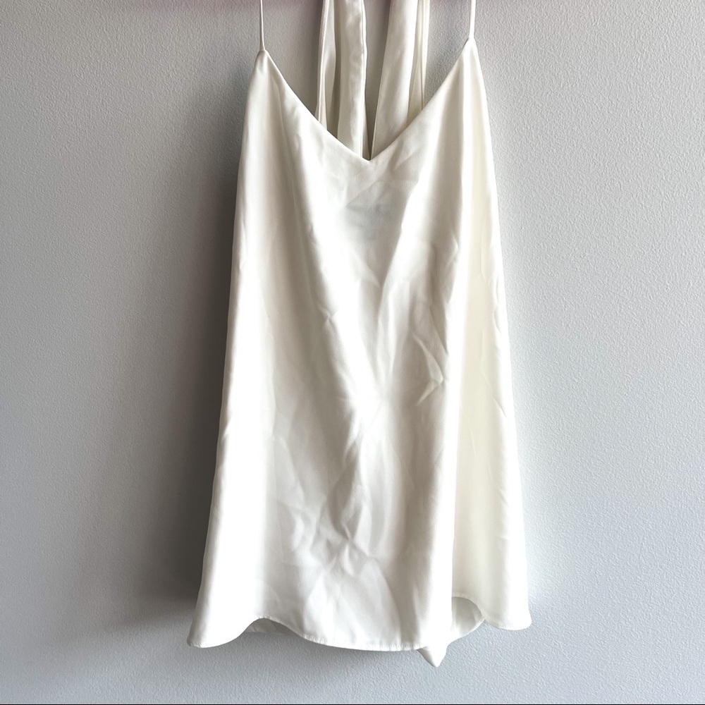 V-neck sleeveless white blouse